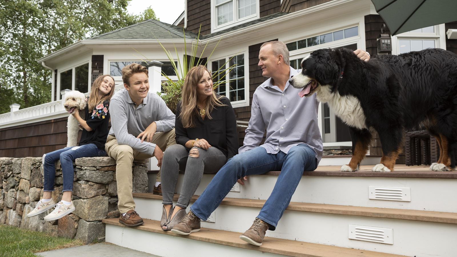 Logan_and_family_on_deck_stairs3_horiz