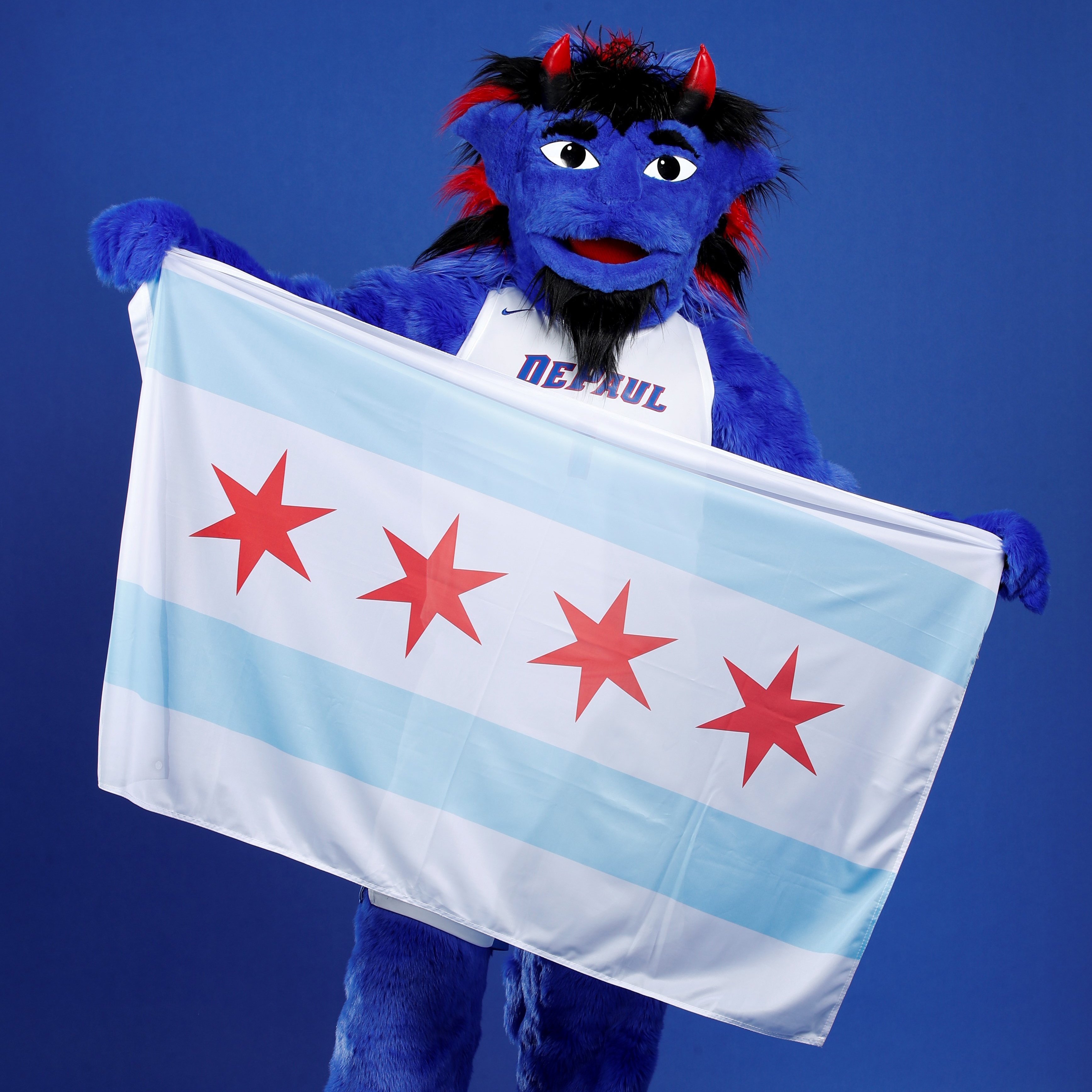 DIBS holding a Chicago flag.