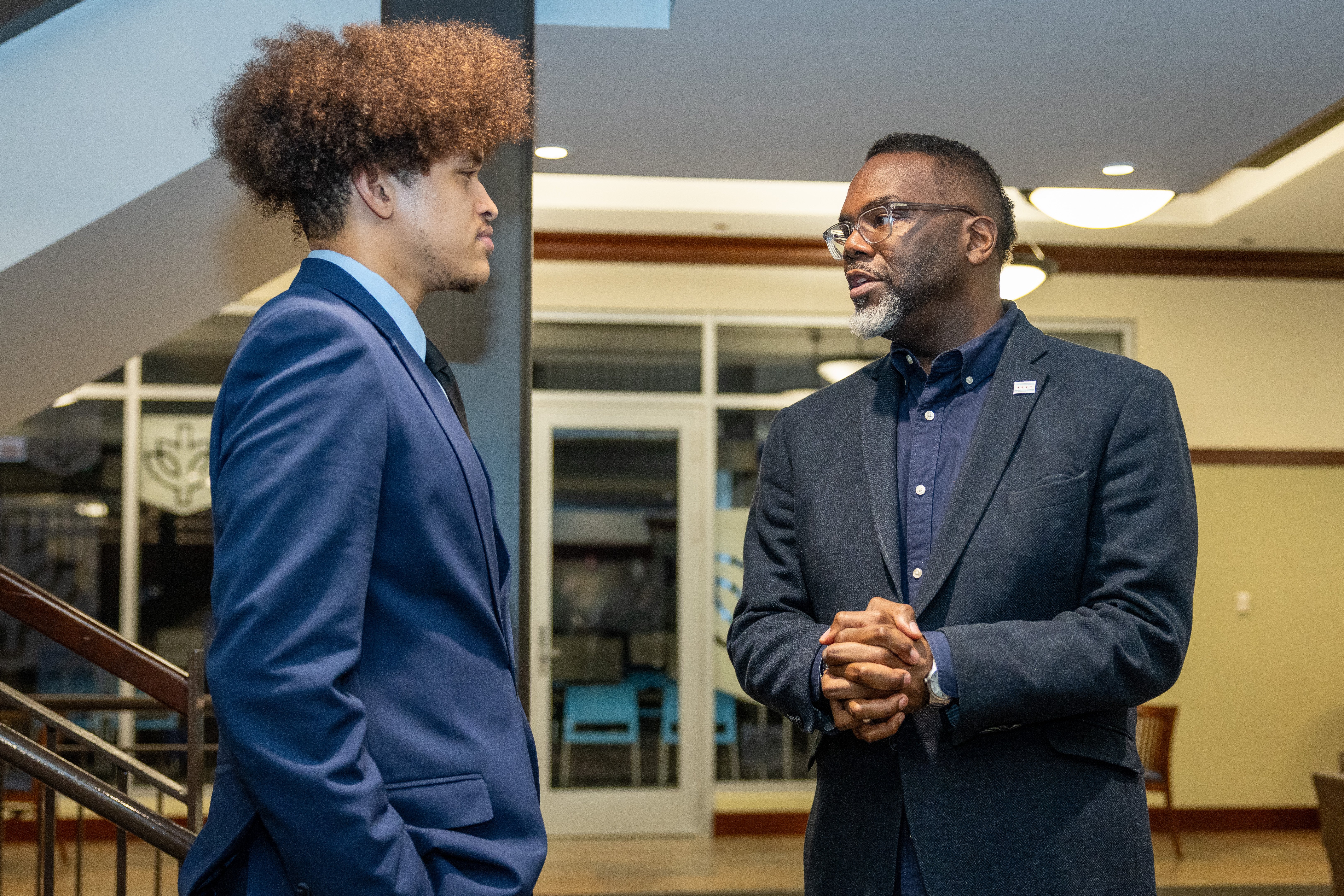 Chicago Mayor Brandon Johnson chats with a DePaul student following his Lakeside Chat series event on the Lincoln Park Campus.