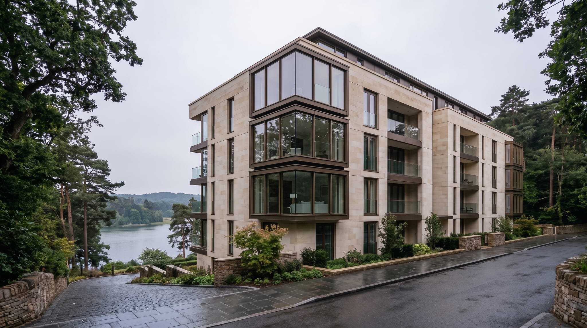 Höhenweg 12 above the Zürichberg, its stacked glazed corner bays turned to the lake.