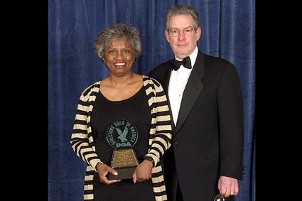 Eastern AD/SM/PA Council Chair Stanley Faer presents the Franklin J. Shaffner Achievement Award to Esperanza "Candy" Martinez.