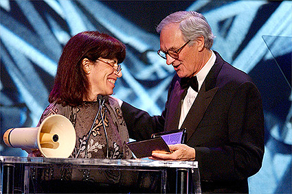 Actor/Director Alan Alda presents the Frank Capra Achievement Award to his former AD Yudi Bennett.