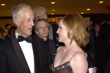 DGA President Michael Apted greets SAG President Melissa Gilbert.