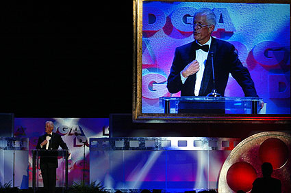 DGA President Michael Apted welcomes the audience.