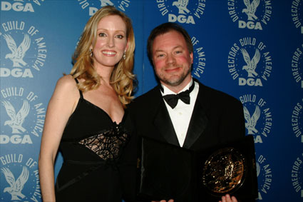 Kevin Lima poses backstage with presenter Janel Maloney.