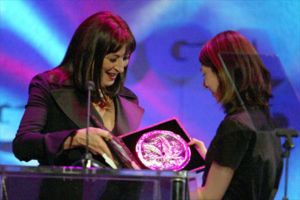 Anjelica Huston presents a 2003 DGA Feature Film Award Nomination medal to Sofia Coppola for "Lost In Translation." 