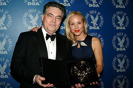 Carpenter celebrates backstage with presenter Bello.