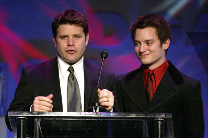 Lord of the Ring's Sean Astin & Elijah Wood are pleased to present a DGA Feature Film Nomination medallion to their director, Peter Jackson. 
