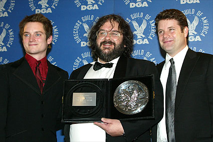 Jackson and his cast show off the nomination medallion to the press.
