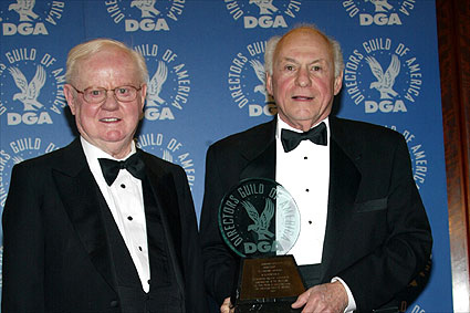 Petrie and Honorary Life Member Auerbach meet the press. 