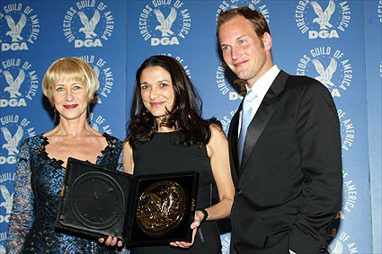 Presenter Helen Mirren, "Angels in America" producer Celia D. Costas and cast member Patrick Wilson show Nichols's award to the press.