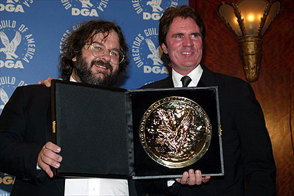 Jackson poses with presenter Rob Marshall.