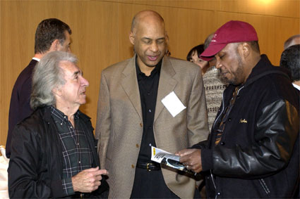 DGA Past President Arthur Hiller, Children's Programs Nominee Oz Scott, and DGA Third Vice President Paris Barclay check the schedule of events.