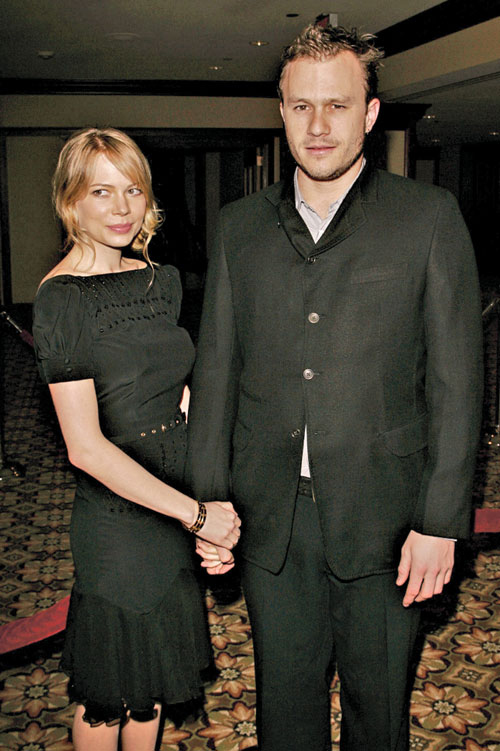 Brokeback Mountain’s Michelle Williams and presenter Heath Ledger.