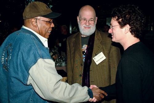 DGA First Vice President Paris Barclay and Feature Film Symposium moderator Jeremy Kagan greet Musical Variety nominee Chuck O’Neil.