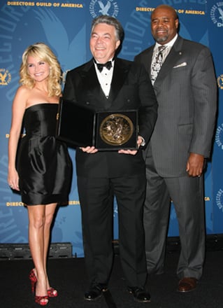 Larry Carpenter with presenters Kristin Chenoweth and Chi McBride.