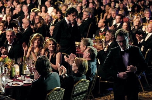 The Coens make their way to the stage.