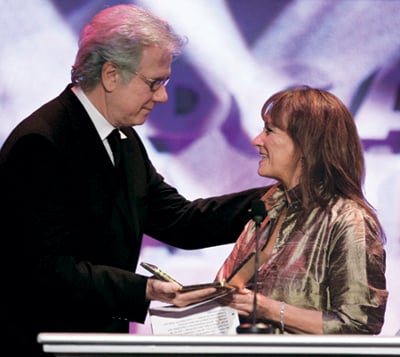 John Larroquette presents the Franklin J. Schaffner Award to his friend Barbara Roche.