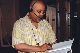  ON THE FLY: Stage Manager Keith Greer keeps his eye on the script. - Photo: Todd Garrin/ABC Photos