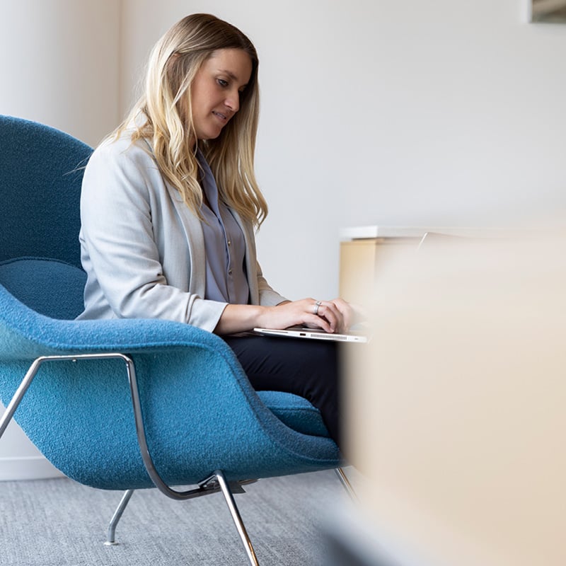 Woman working in chair to illustrate Corporate Venture Capital