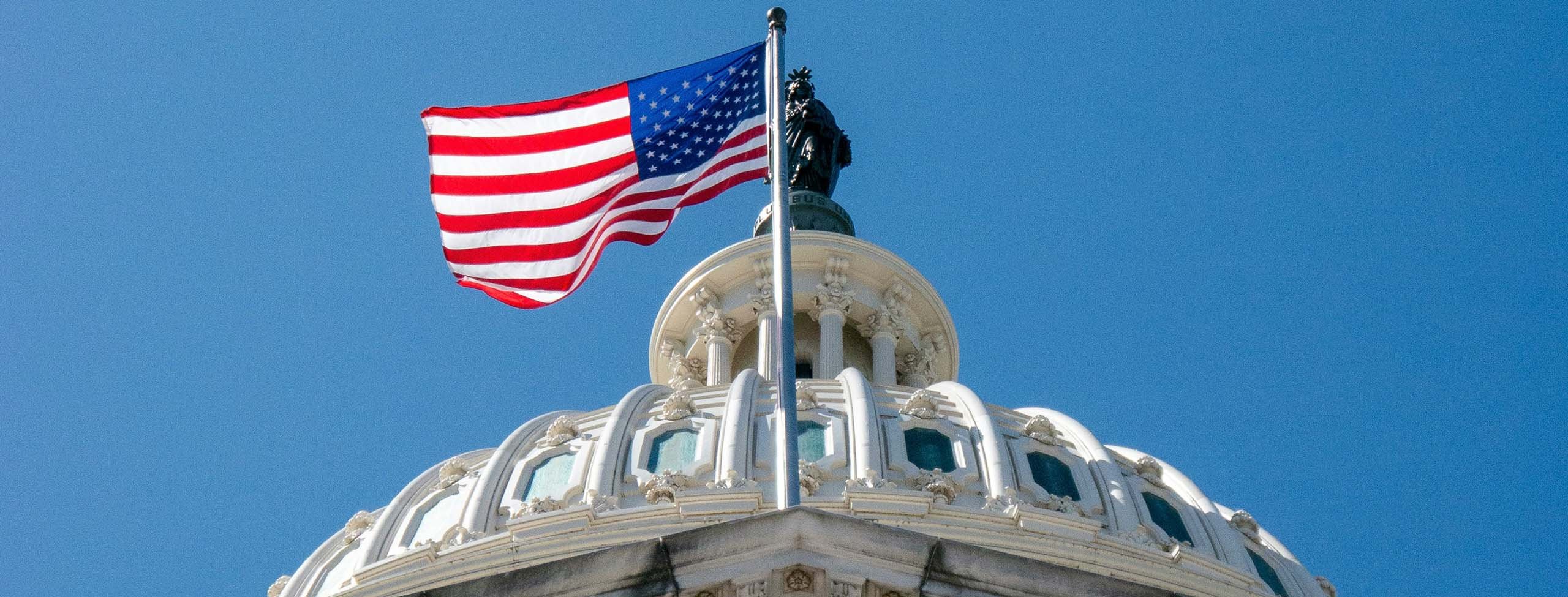 Capitol Hill with flag 2560x975