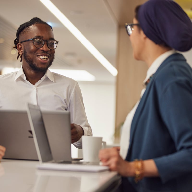 Colleagues meeting to illustrate international corporate reorganizations