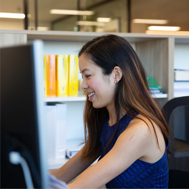 Woman in office to illustrate transactional tax