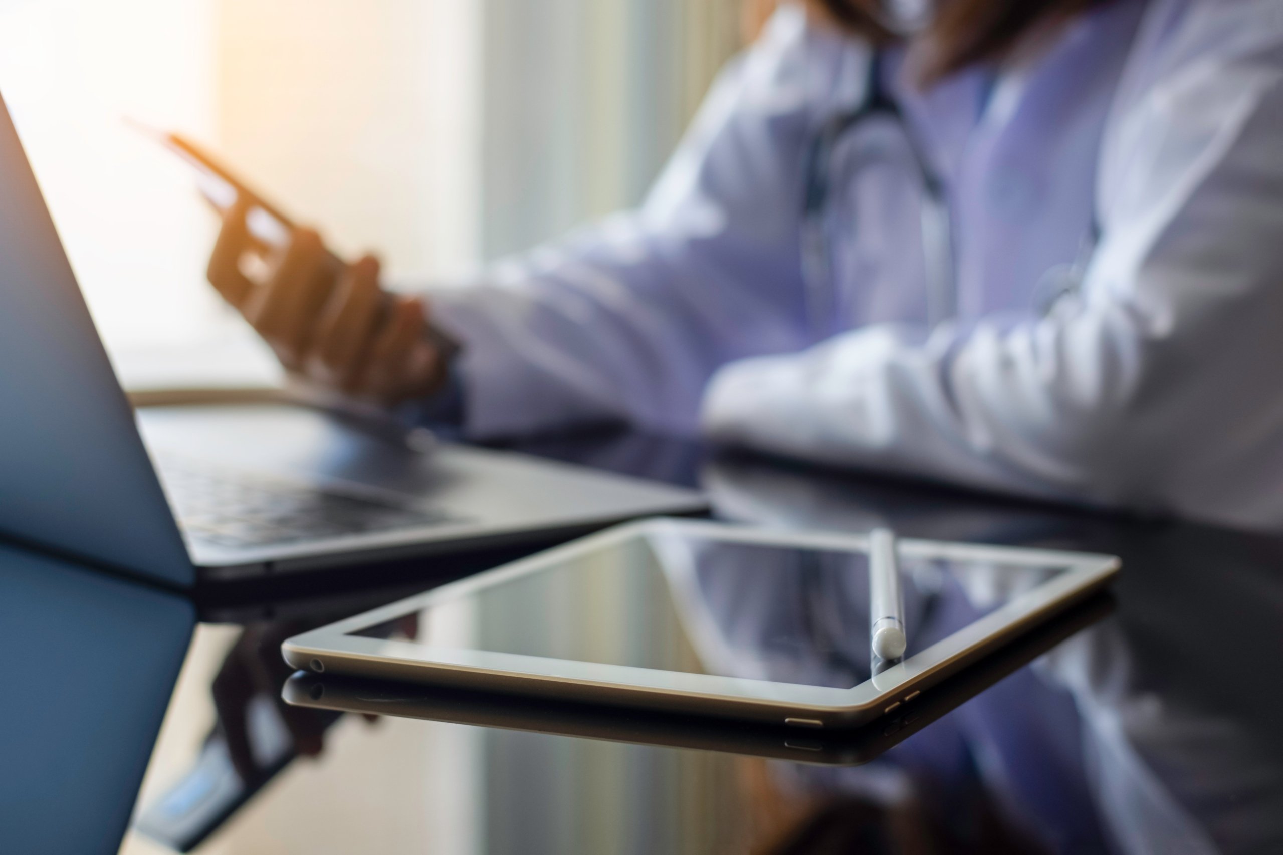 Doctor holding cell phone