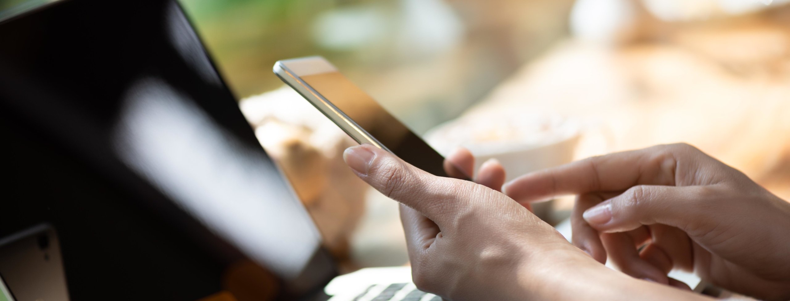 Woman holding a cell phone