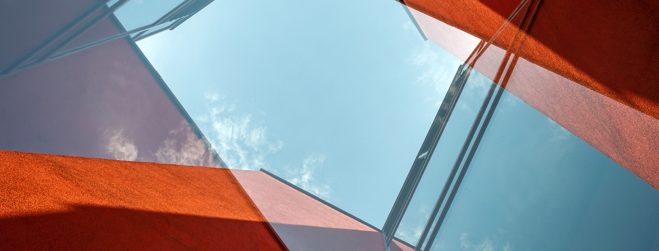 Abstract red building blue sky