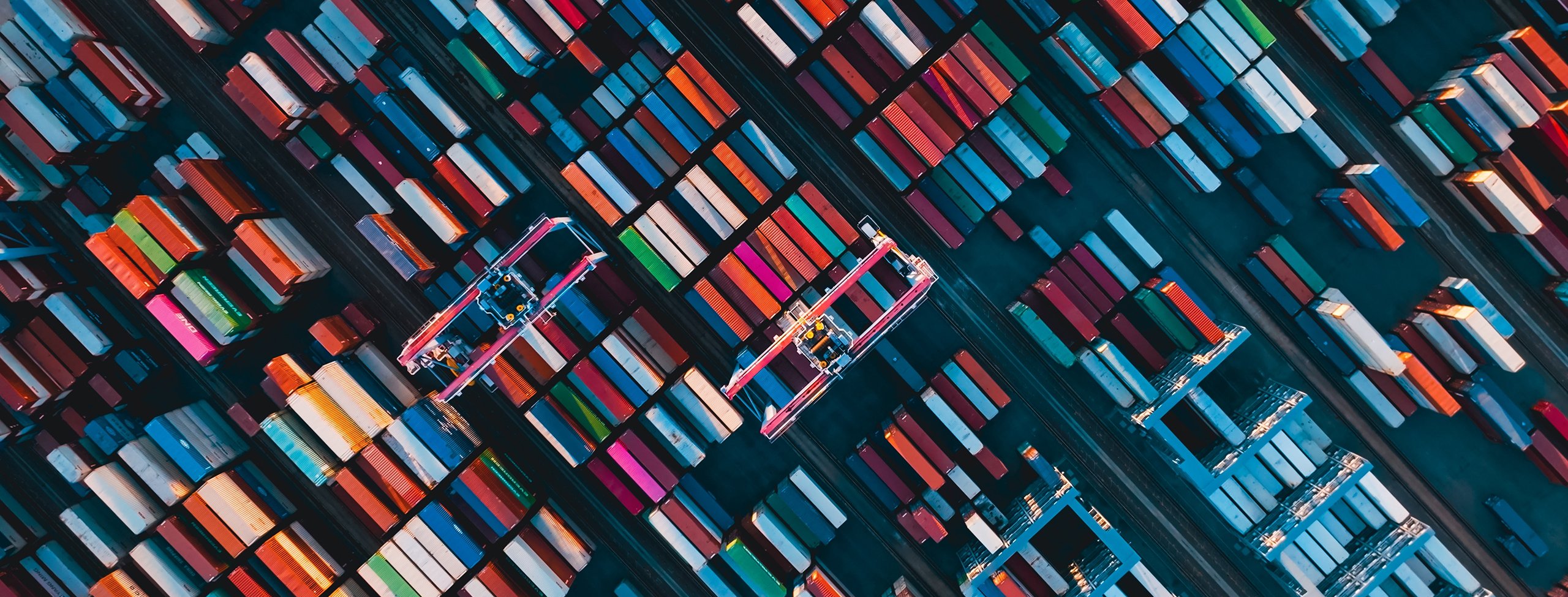 Aerial view of a container port 2560x975