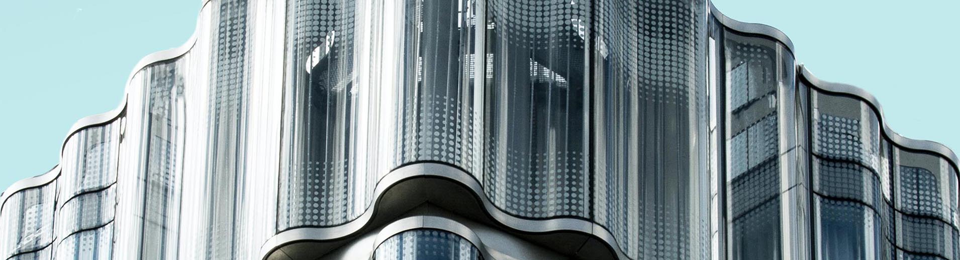 Curved glass gray building_PPT1910x520