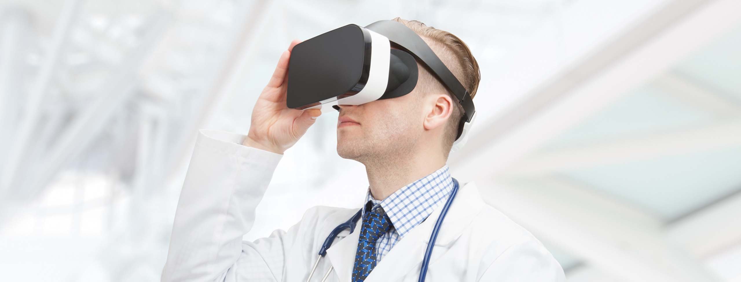 Doctor wearing virtual goggles