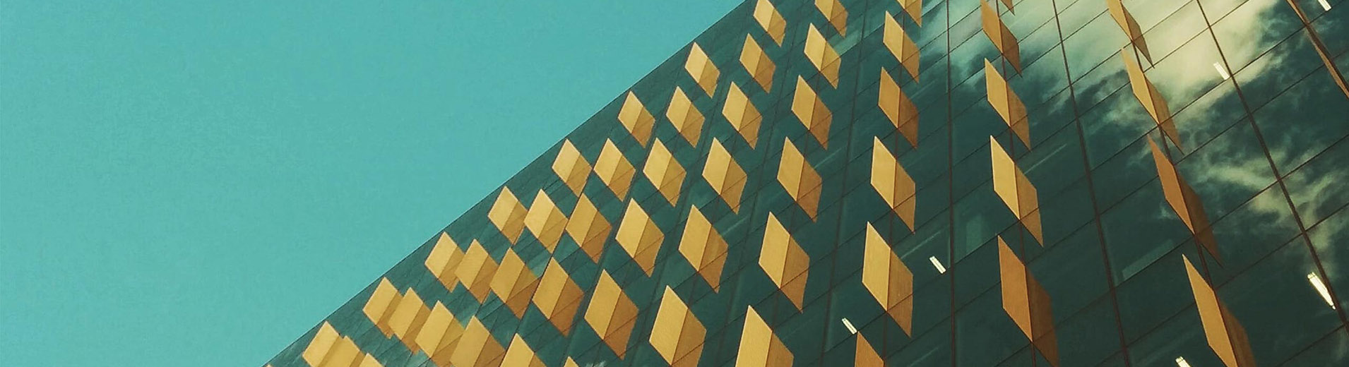 Glass building with yellow details