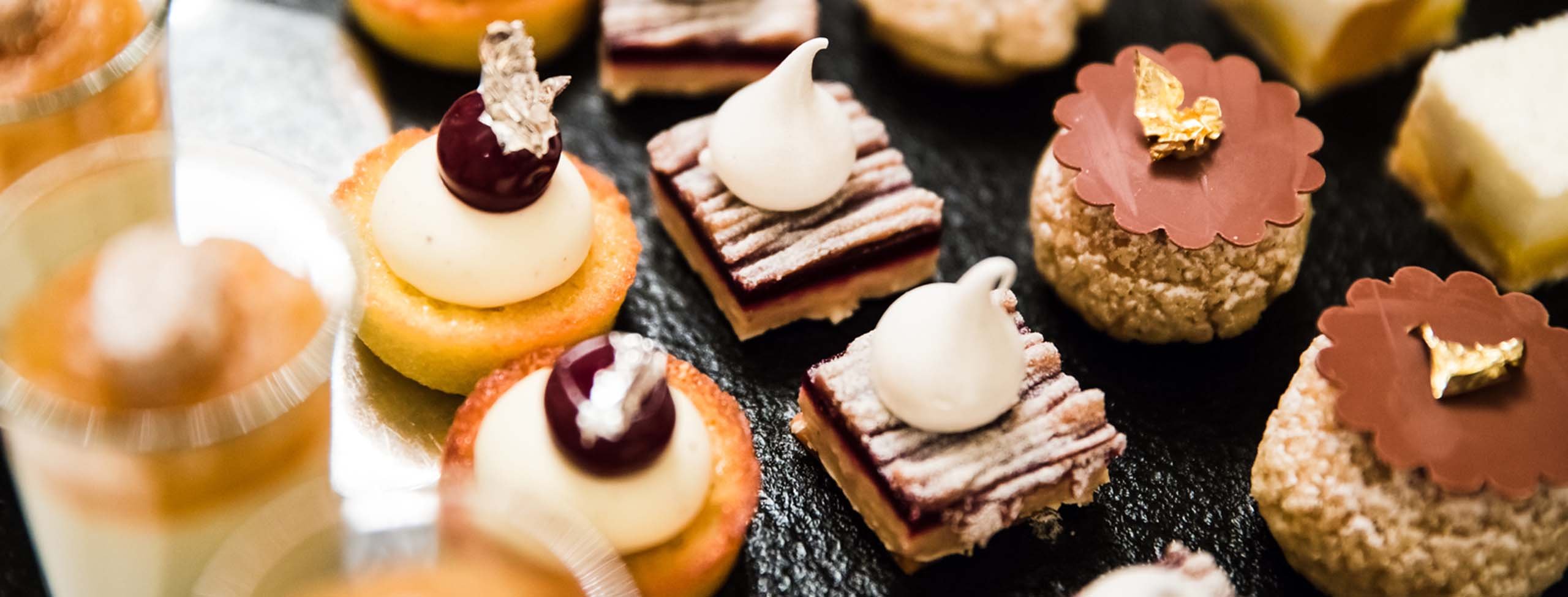 gold and silver foiled wedding desserts