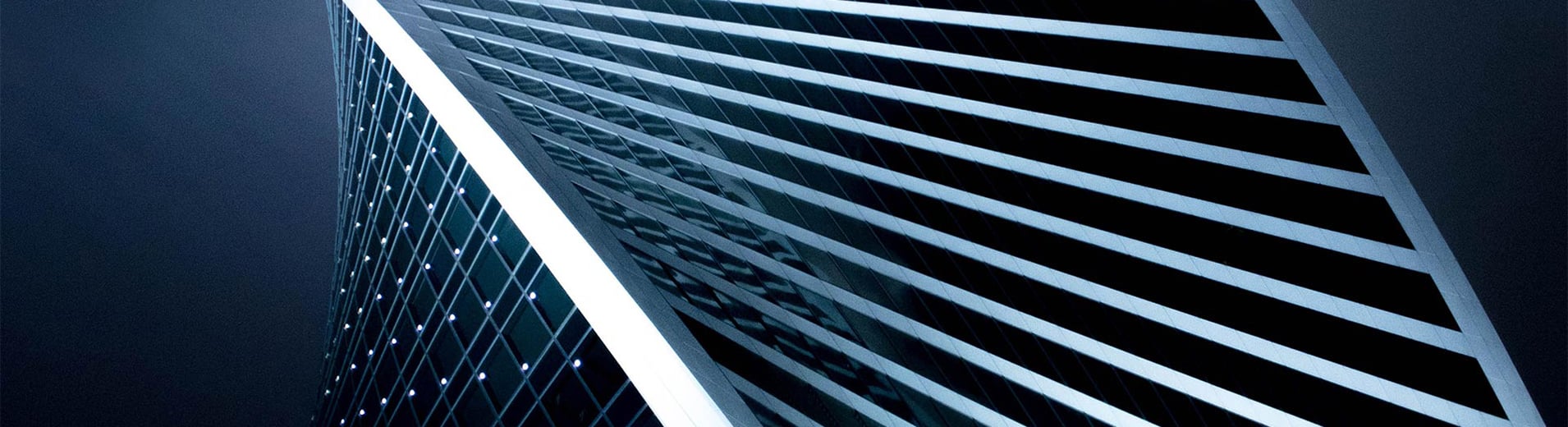 Gray spiral building at night_PPT12