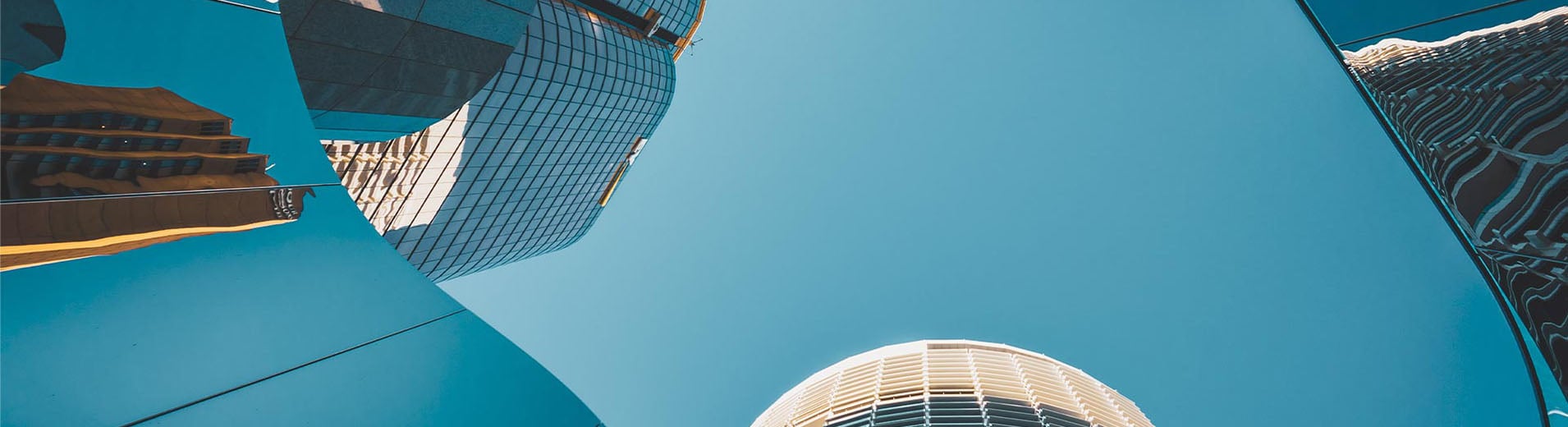 Low angle photo of mirror high rise buildings_PPT