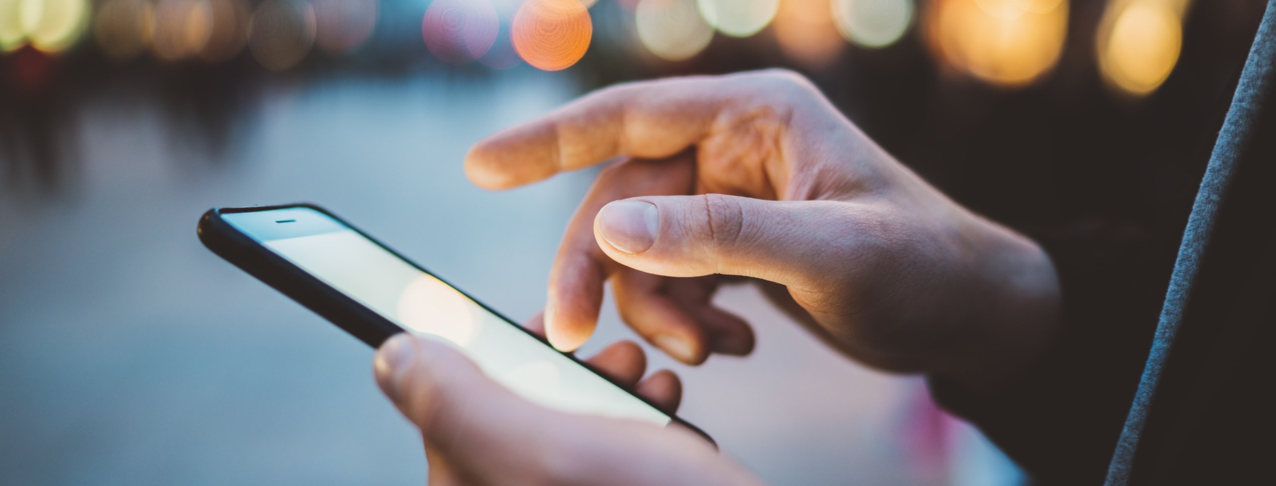 Man holding mobile phone