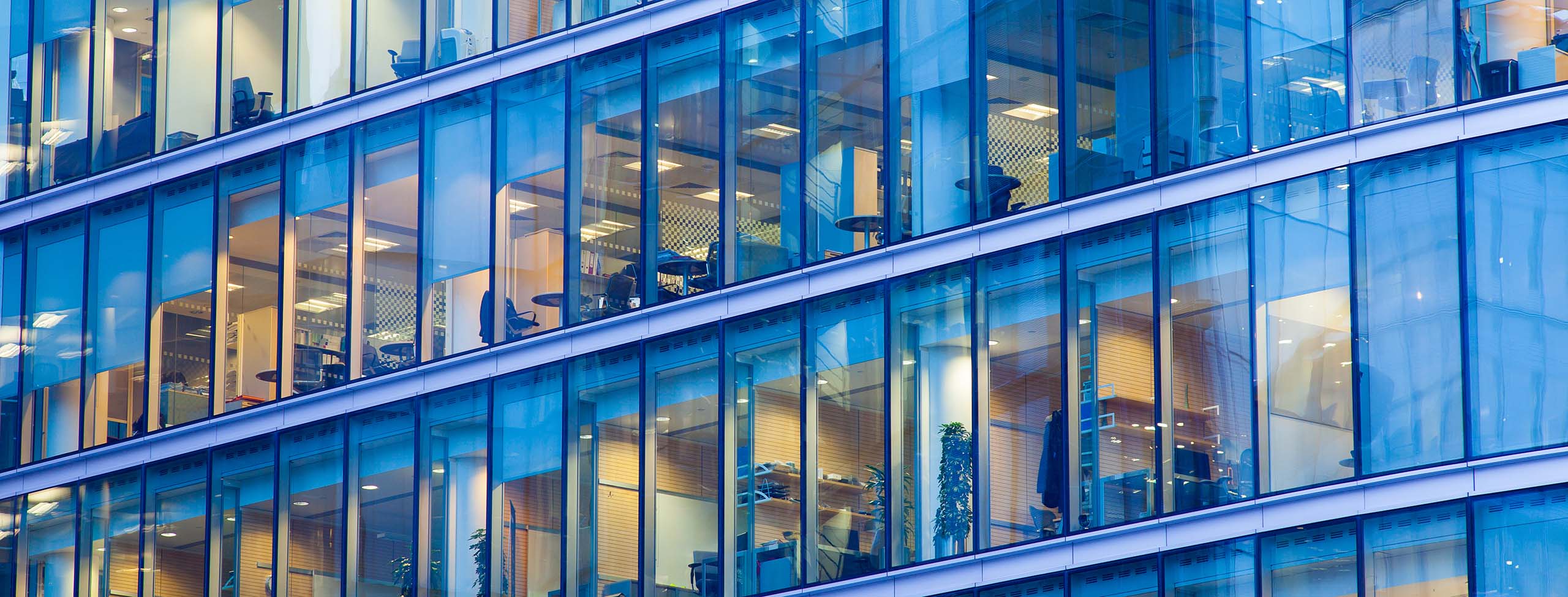 Modern glass building 2560x975