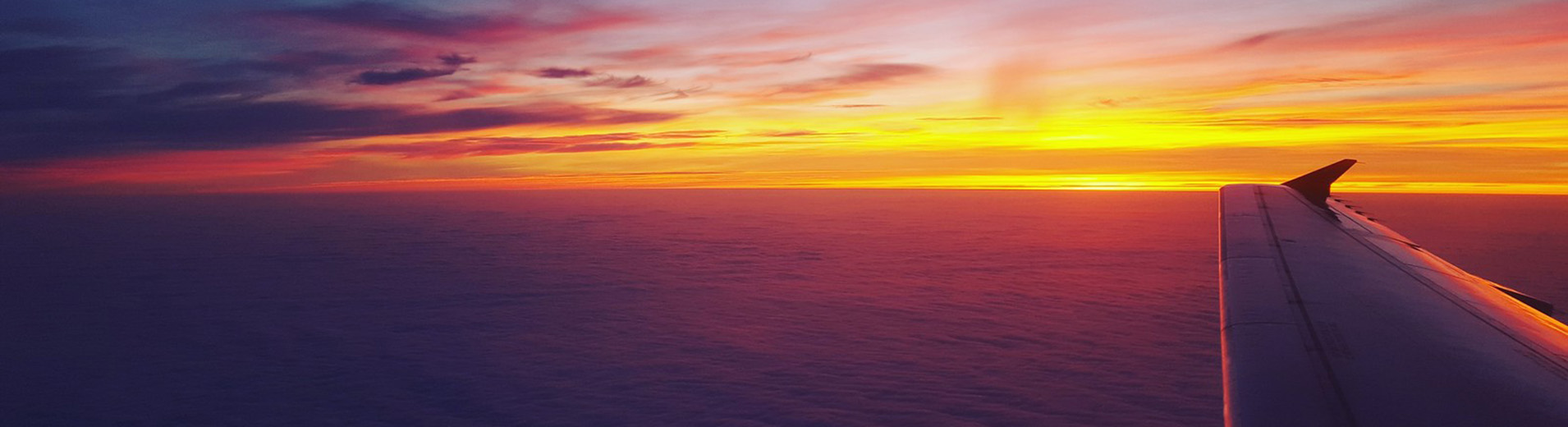 Plane_window_view_at_sunset_S_2527