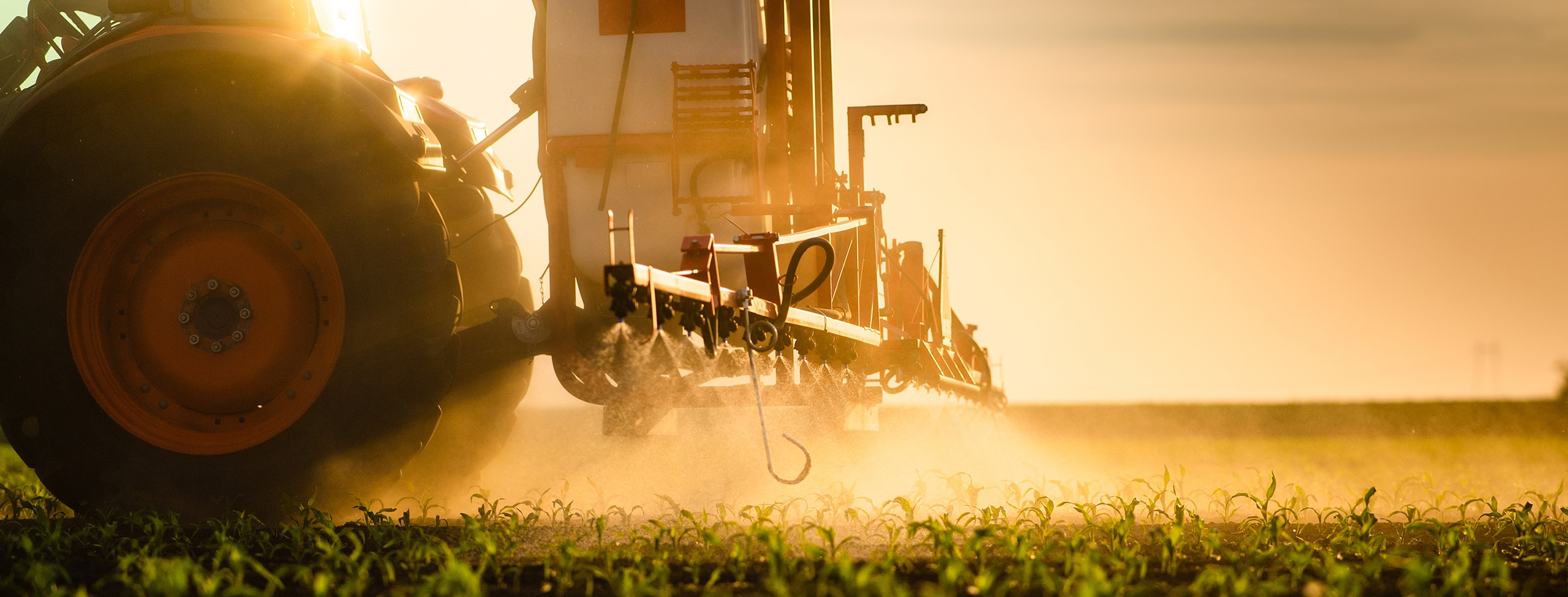 tractor spraying pesticides
