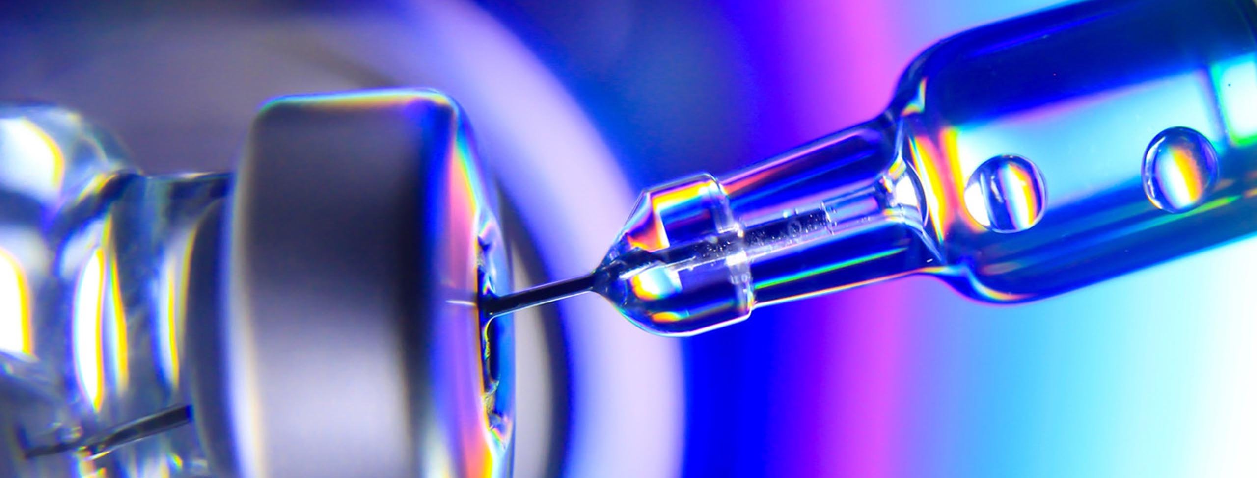 Vaccine vial with syringe