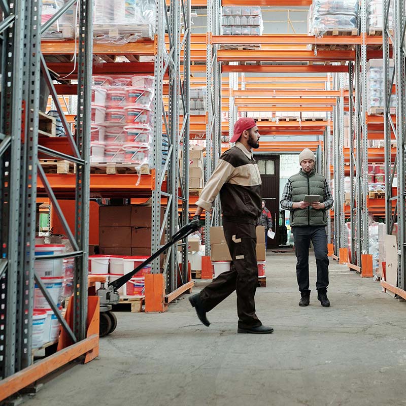 Warehouse worker pulling a cart_square