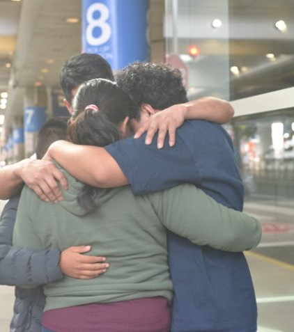 Immigration hug photo