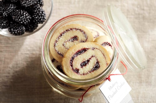A jar of blackberry swirl almond cookies