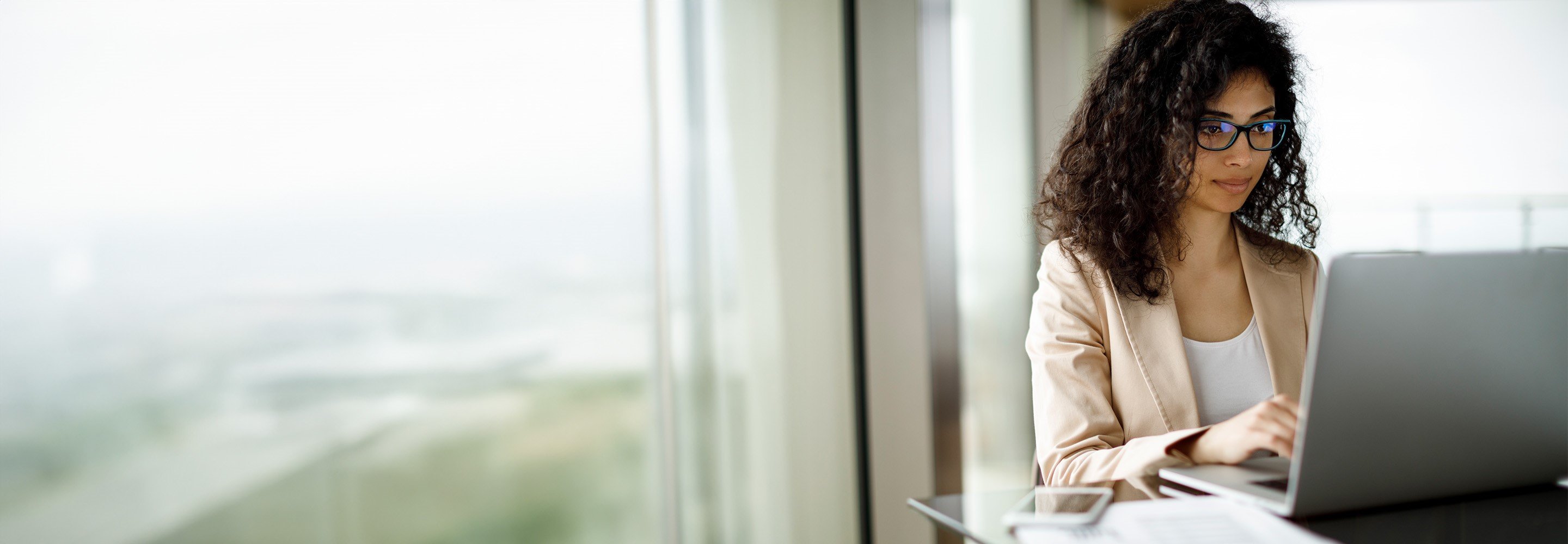 woman looking at laptop