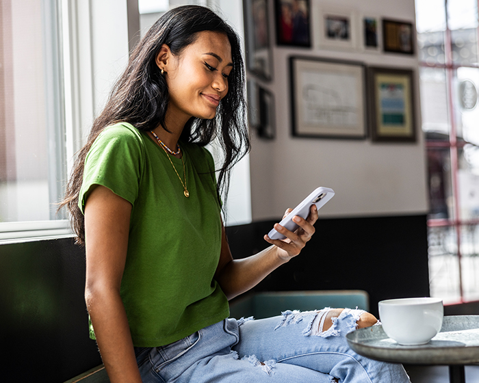 woman looking at phone