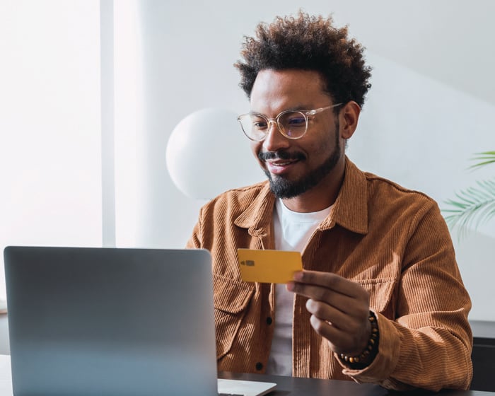 man online shopping with card