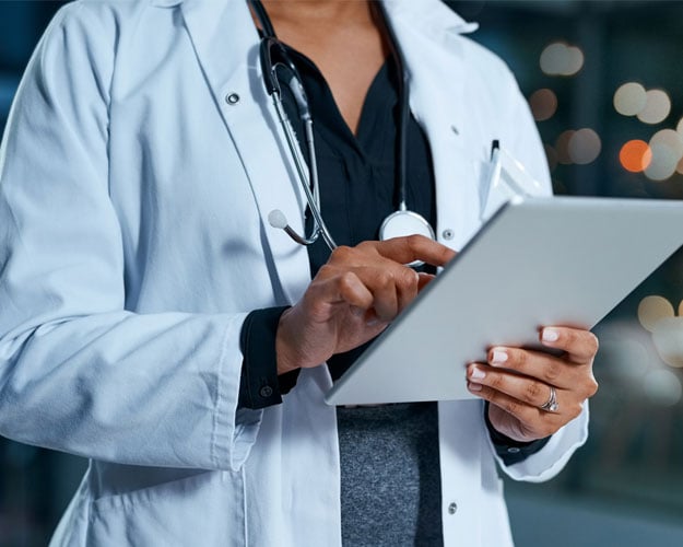 Doctor-evaluating-healthcare-reports
