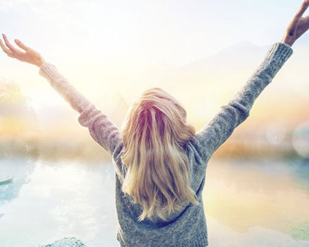woman standing in the sun